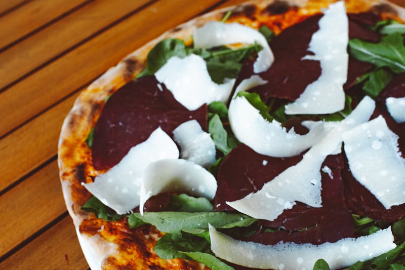 Arugula and prosciutto salad with shaved Parmesan